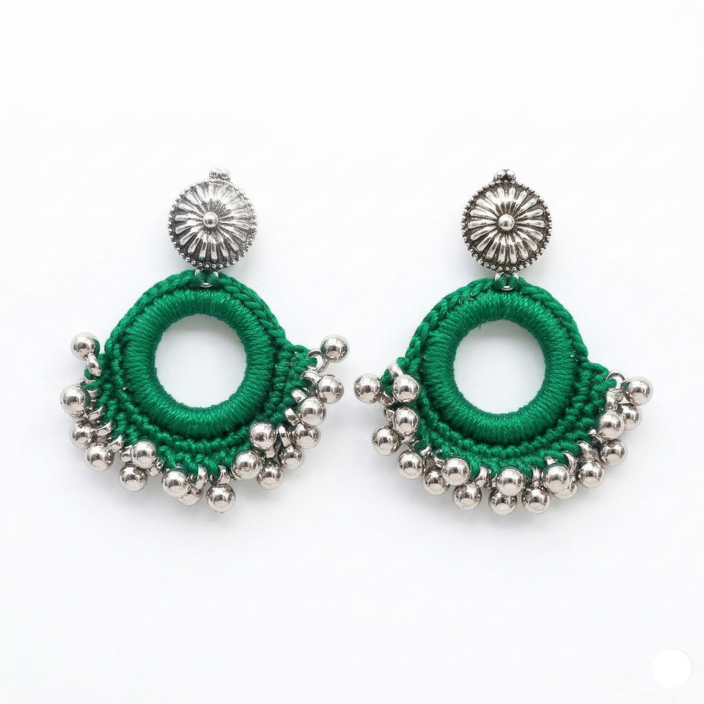 Handcrafted green thread crochet hoop earrings featuring silver-toned beads and ornate sunflower-style studs on a white background.