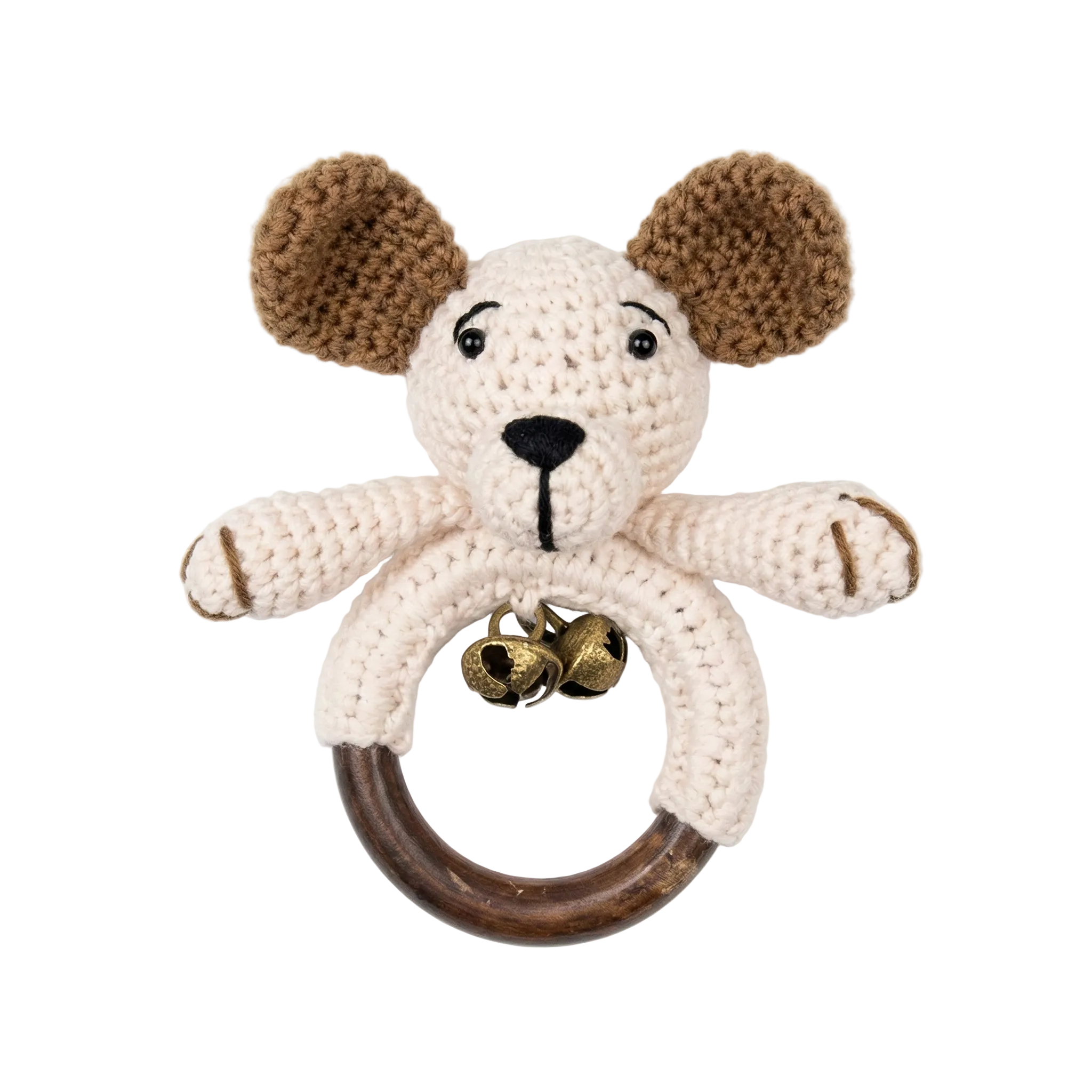 Photorealistic studio shot of a white and brown crochet puppy dog rattle attached to a dark wooden teething ring with small brass bells, isolated on a white background.