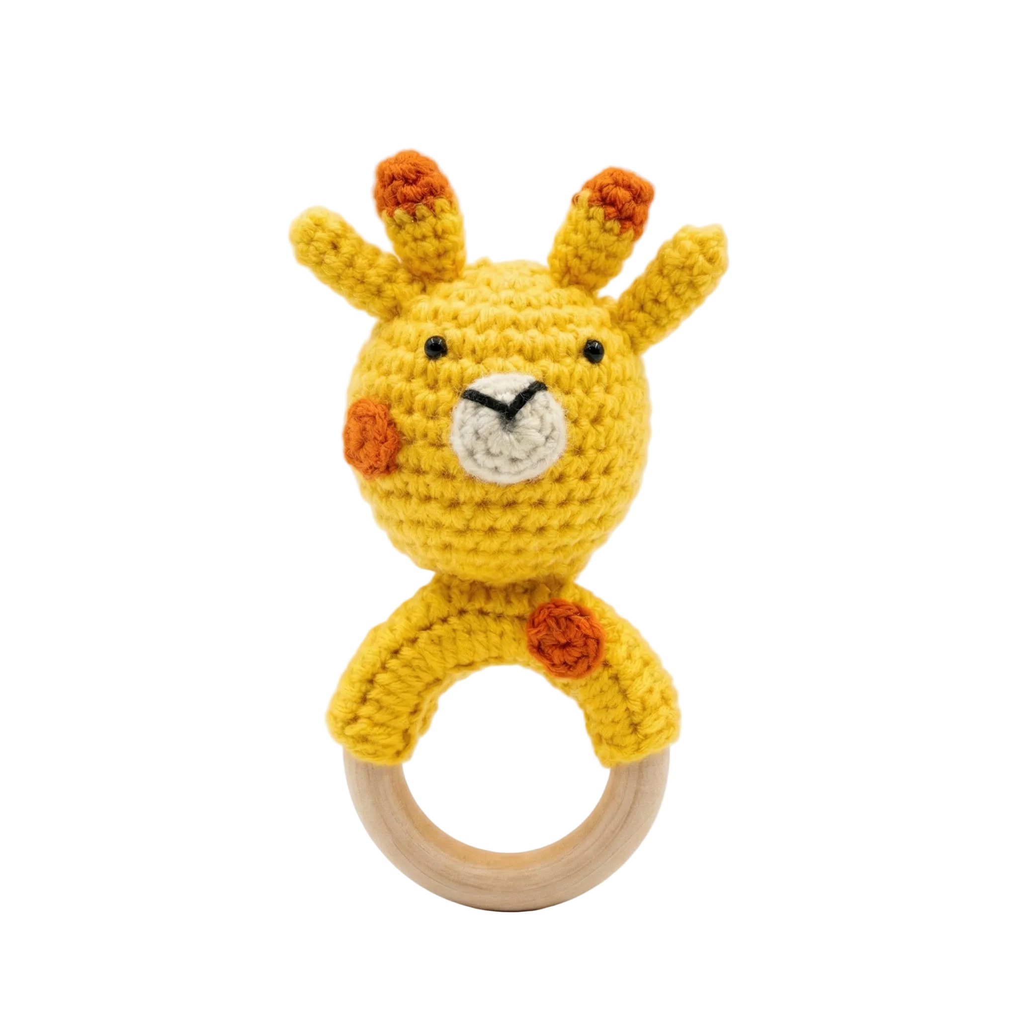 Yellow and orange crochet giraffe baby rattle toy attached to a smooth wooden teething ring on a white background.