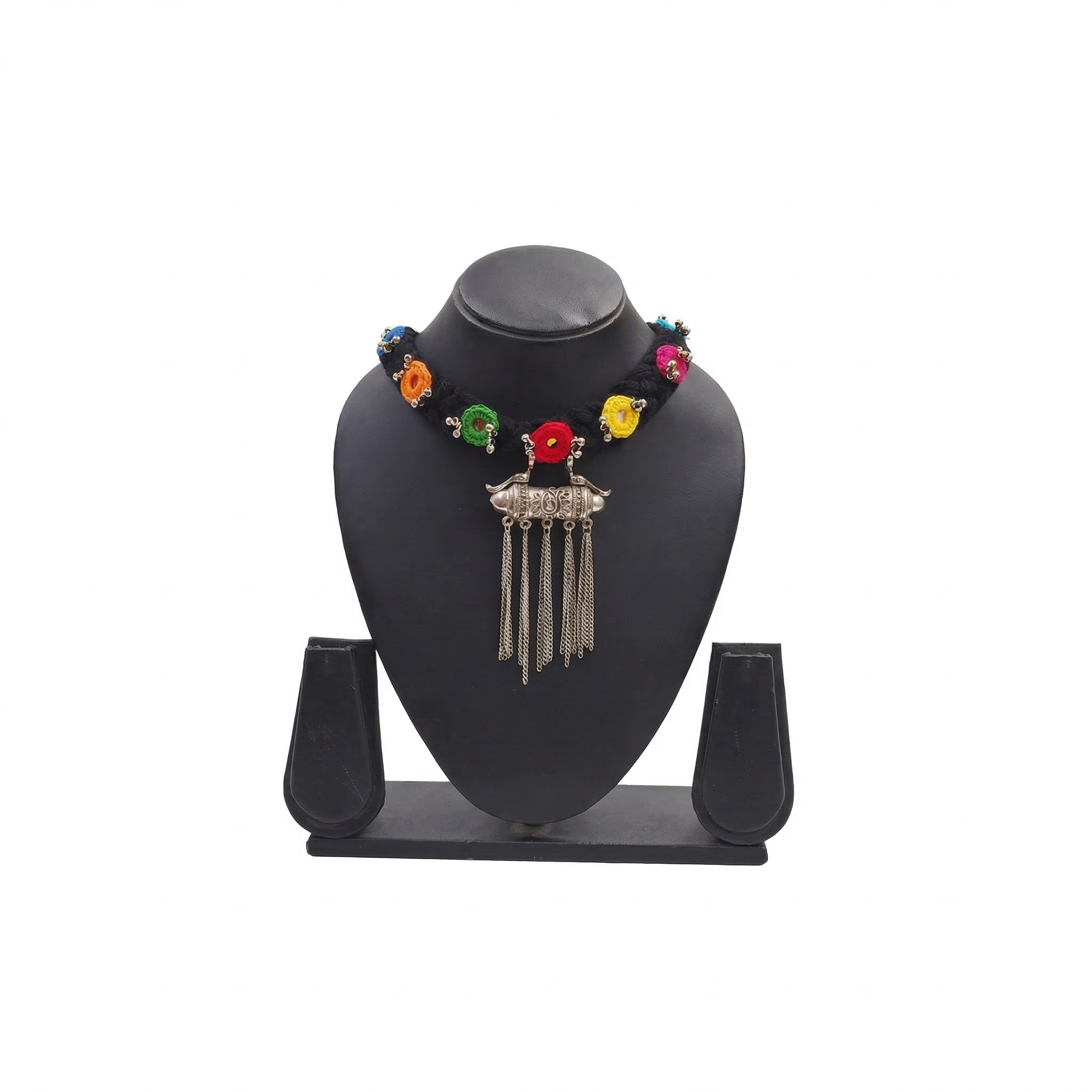 Black thread choker necklace featuring multicolored floral embroidery and an antique oxidized silver pendant with dangling chains on a black display stand.