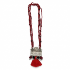 Oxidized silver floral engraved pendant necklace with multi-strand red thread beads and large red silk tassel.