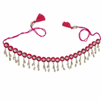 Bohemian pink fabric choker necklace featuring white cowrie shells, silver beads, and pink tassels on a white background.