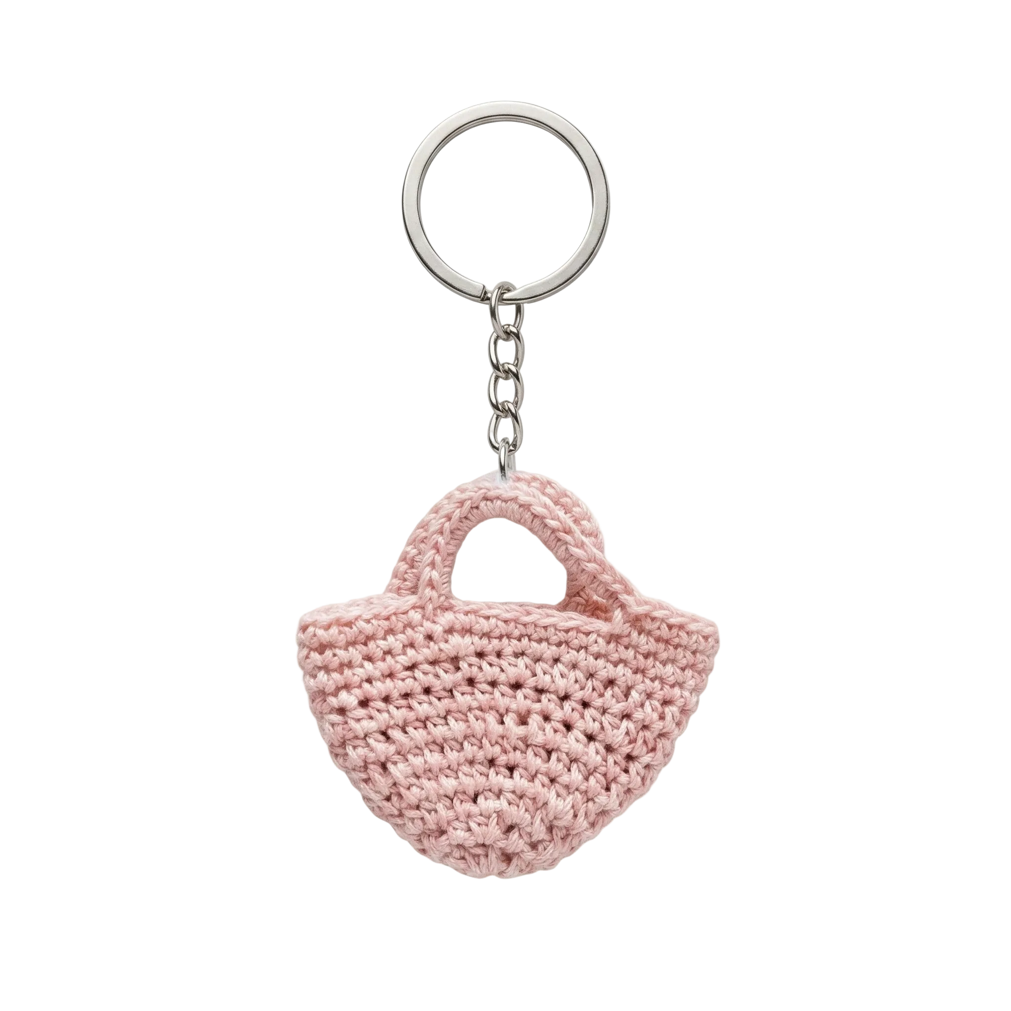A light pink miniature crocheted tote bag attached to a silver metal keychain ring against a plain white background.