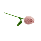 A single pink crocheted tulip flower with a green stem and leaf, isolated on a white background.