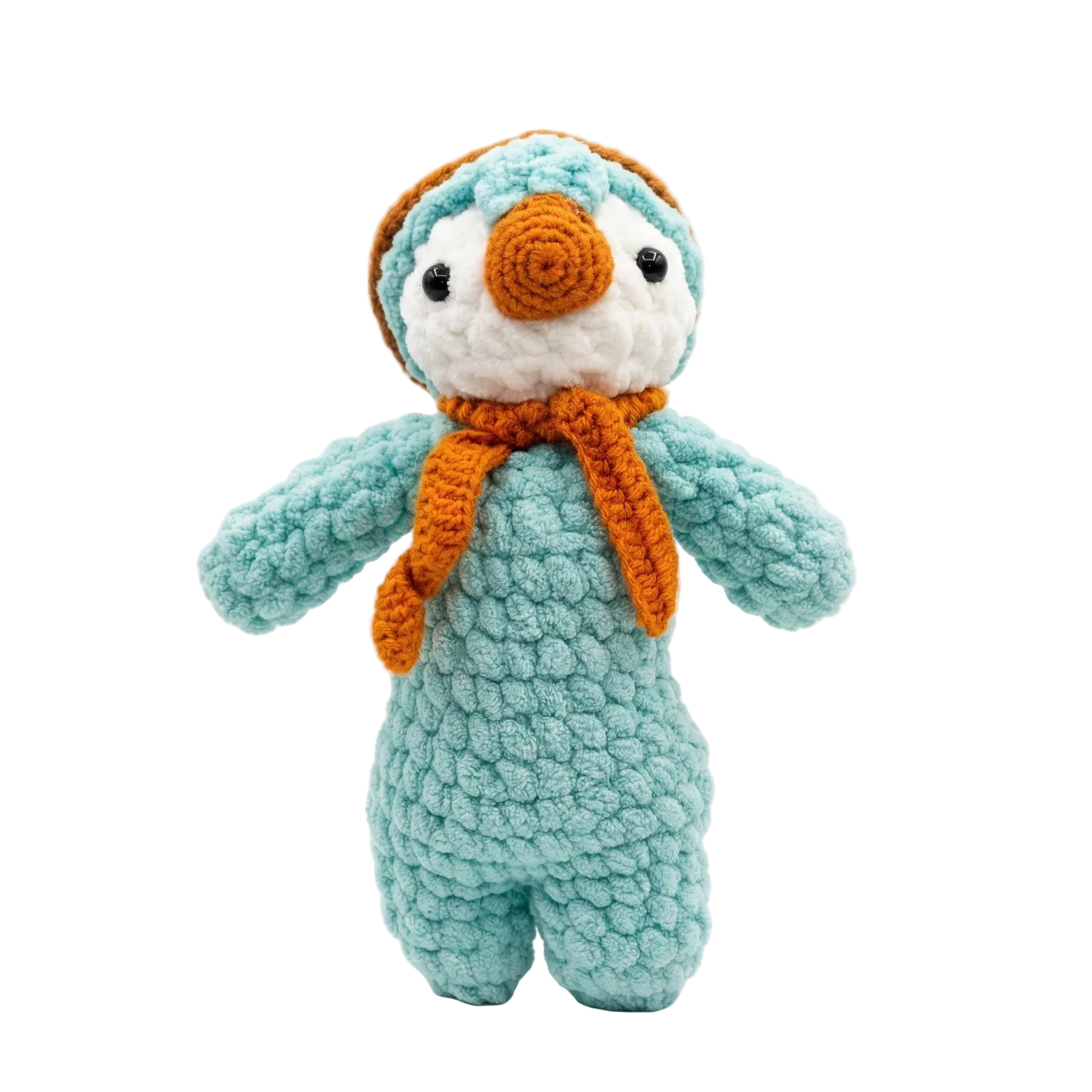 A  photorealistic studio shot of a handmade teal and white crochet penguin plush wearing an orange knit scarf, isolated on a clean white background.