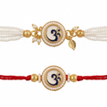 Two traditional Om rakhis on white background: one with multi-strand white pearls and one with classic red thread.